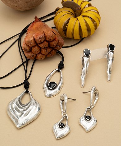 Ready to wear and charms with organic inspiration, silver pated with enamel details for jewelry designers