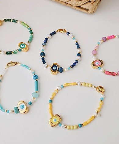 Wholesale evil eye metalic beads with enamel, gold plated charms and beads for jewelry brands and designers