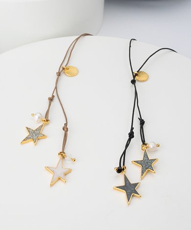 Star motif inspiration for jewelry designers with enamel and glitter